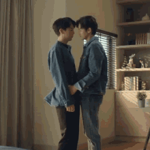 Holding Your Hand Gene GIF