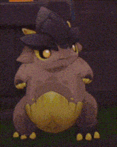 a cartoon frog wearing a witch hat is standing on a grassy field .