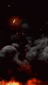 a large explosion with smoke coming out of it in the dark