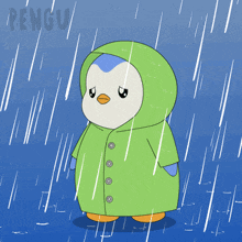 a penguin wearing a green raincoat is in the rain