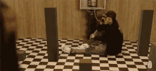 On The Phone On The Floor GIF