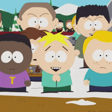 a group of south park characters including a boy wearing a shirt that says t