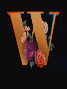 the letter w is surrounded by flowers and a star