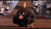 a black angry bird from the angry birds movie is standing on a wooden platform .