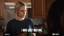 a woman says i was just waiting while holding a cloth