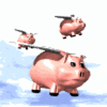 a piggy bank with wings is flying through the air .