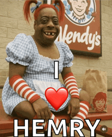 a wendy 's sign is behind a woman in a wendy 's dress