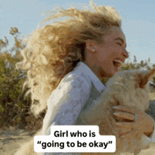 a woman holding a dog with the words girl who is " going to be okay "