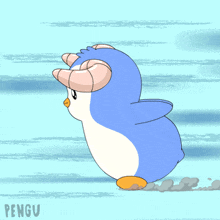 a blue and white penguin wearing a hat with the word pengu on it