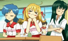 a group of anime girls are standing in a classroom .