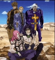 a group of cartoon characters standing next to each other on a rock in the desert .