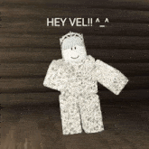 a cartoon character with a crown on his head is standing on a wooden floor and says hey vel