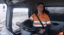 a man driving a truck with the hashtag # mafs on the bottom