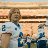 a man in a football uniform has the number 2 on his chest