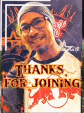 a man wearing glasses and a red bull shirt with the words thanks for joining