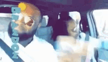 a man and a woman are sitting in a car with the word brook on the bottom of the image .