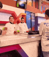 a woman wearing a t-shirt that says ' real love ' on it