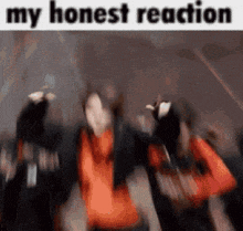 a blurry picture of a group of people dancing with the words `` my honest reaction '' written on the bottom .