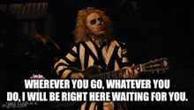 a man in a striped shirt is playing a guitar and says wherever you go whatever you do i will be right here