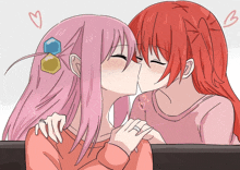 a drawing of two girls kissing each other with hearts around them