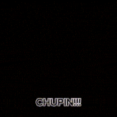 a man in a suit and tie says chupin !!