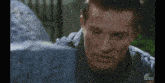 a close up of a man 's face with abc on the bottom right