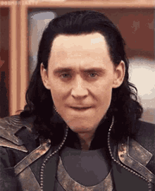 loki from avengers : age of ultron is making a funny face and looking at the camera .