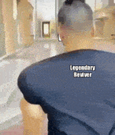 a man 's back is shown with the words " legendary reviver " written on it