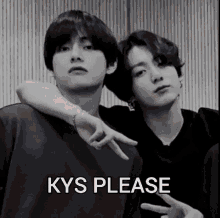 a black and white photo of two young men standing next to each other with the words kys please written on the bottom .