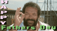 a man with a beard is giving the ok sign and the words happy fathers day are behind him