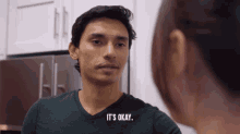 a man says it 's okay while looking at a woman