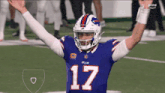 a football player wearing a blue jersey with the number 17 on it