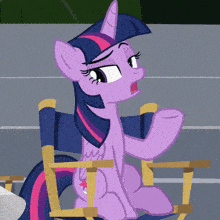 twilight sparkle from my little pony is sitting in a directors chair