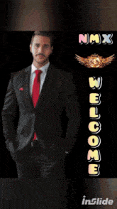 a man in a suit and red tie is standing in front of a sign that says welcome