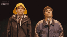 a poster for son of a glitch shows two actors singing into microphones