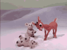 Rudolph Cuteness GIF - Rudolph Playing Snow GIFs