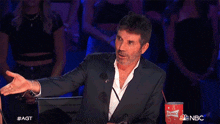 Holding Hand Out Simon Cowell GIF - Holding Hand Out Simon Cowell America'S Got Talent GIFs