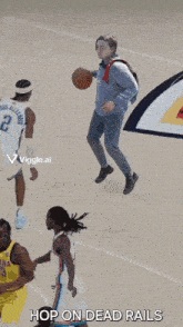 a basketball is being thrown on a court with the words hop on dead rails written on the floor