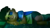 a cartoon character is laying on a bed with a bandage on his eye
