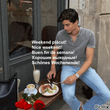 a man sits at a table with a plate of food and a cup of coffee and says weekend placut nice weekend buen fin de semana
