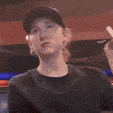 a blurry picture of a man wearing a hat