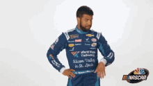 a man wearing a racing suit that says silicon valley in st. louis