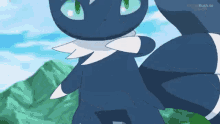 a black cat with green eyes is standing in front of a mountain in a cartoon .