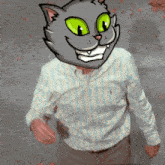 a man wearing a striped shirt has a cat head on his head
