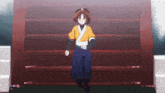 a girl in a yellow shirt and blue pants stands in front of a red door