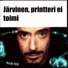 a close up of a man 's face with the words " jarvinen printeri ei toimi " on the bottom
