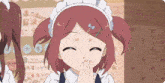 a girl with red hair is wearing a maid outfit and covering her mouth