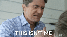 a man says " this isn 't me " while talking to another man
