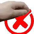 a hand is holding a red x in a circle