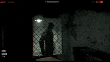 a video of a man standing in a doorway is being recorded with the auto setting